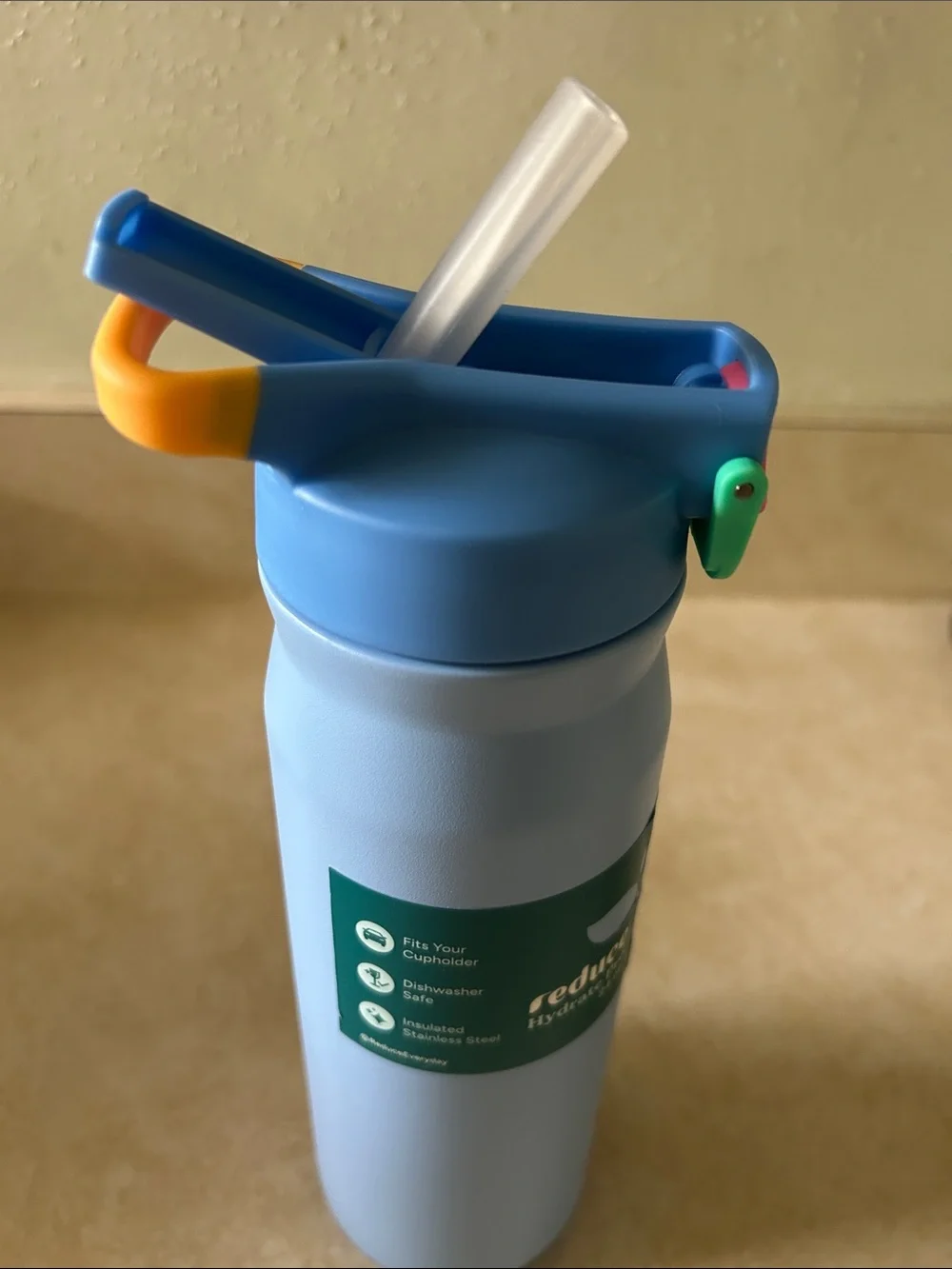 Reduce Hydrate Pro 24 oz Insulated Water Bottle — Light Blue with Colorful Lid